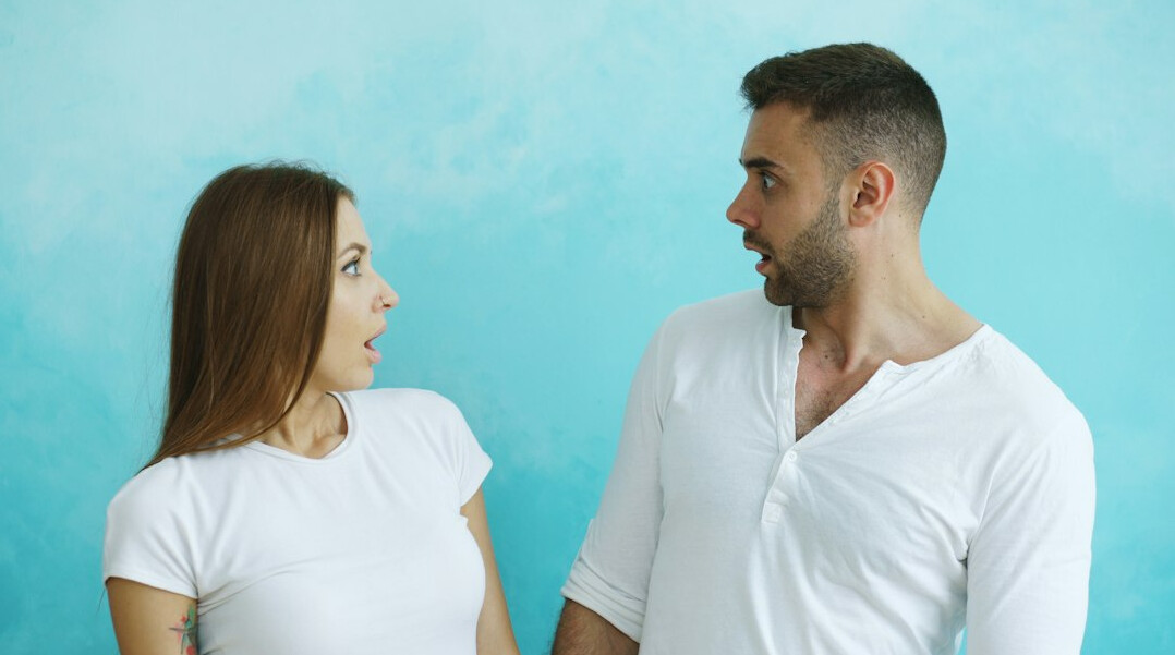 woman and man talking closely