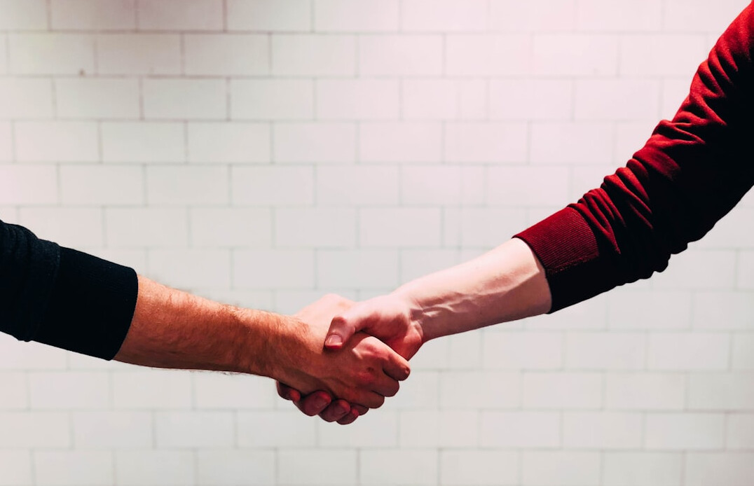 celebrity handshake after scandal